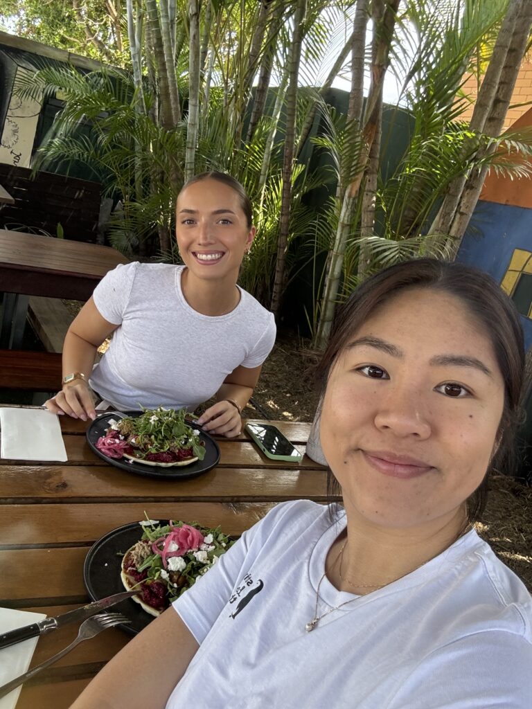 Smiling team enjoying lunch and monthly catchup.